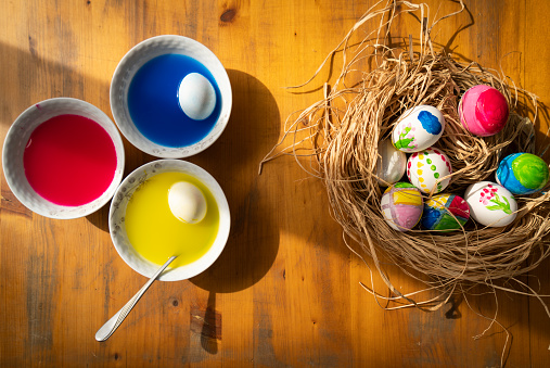 Coloring eggs with dye for Easter