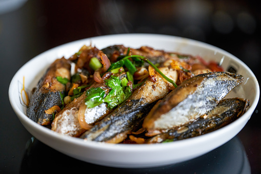 A plate of delicious Chinese home cooking, Braised Mackerel
