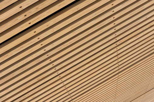 Close-up of wooden ceiling slat.