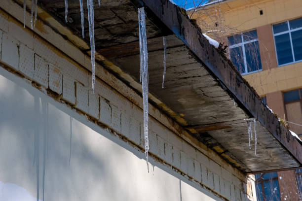 istock icicles and melting snow on the roof 1478318230