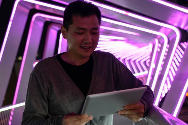 istock Asian business men use tablets on the overpass 1478318258