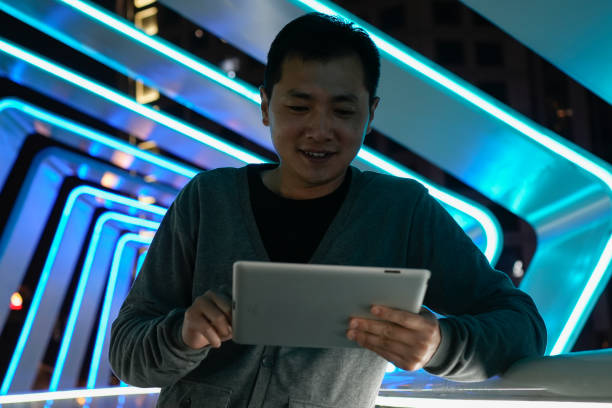 istock Asian business men use tablets on the overpass 1478318259