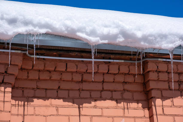 istock icicles and melting snow on the roof 1478318475