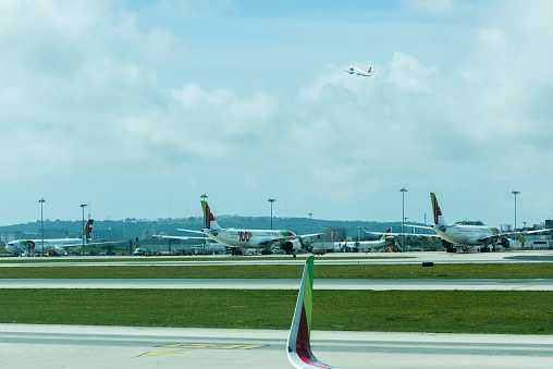 Lisbon, Portugal - March 30, 2023: Air Portugal airplanes at in Lisbon International Airport, Portugal