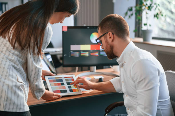 istock Creative job. Two designers are working together in the modern office 1478328485
