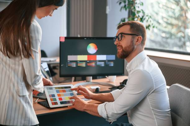 istock Creative job. Two designers are working together in the modern office 1478328492