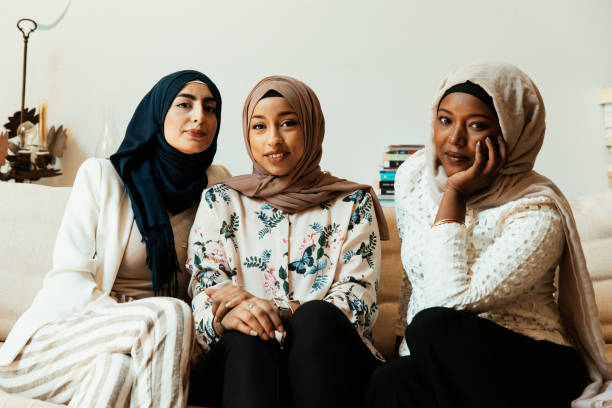 istock Three arab friends at home 1478339832