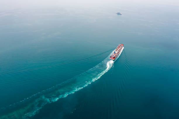 istock container ship sailing full speed to transport goods in containers for import export internationally and worldwide, business services transportation by container ship open sea, photograph aerial view 1478342466