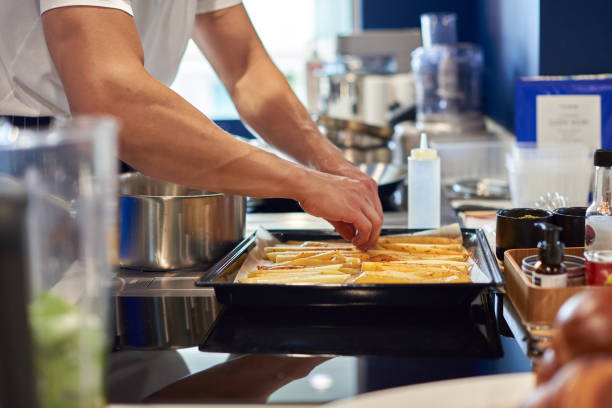 istock Chef preparing potato French fries 1478345611