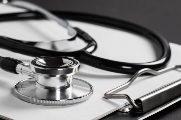istock Stethoscope laying on patient information blank. 1478347346