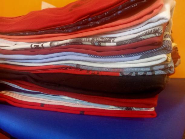 istock A pile of assorted ironed and folded clothes 1478347455