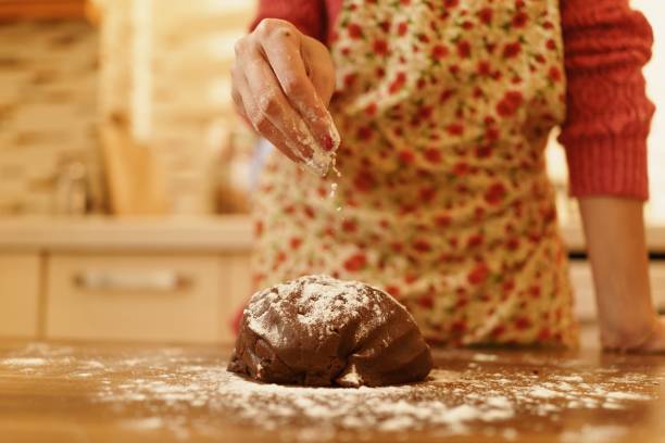woman making cookies in the kitchen