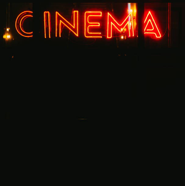 istock Red neon cinema sign illuminated at night 1478350813