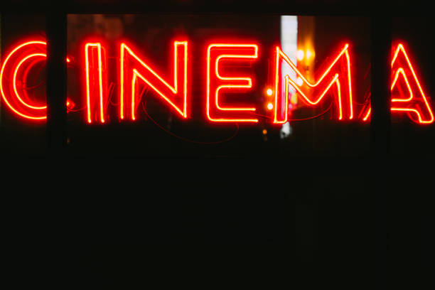 istock Red neon cinema sign illuminated at night 1478350816