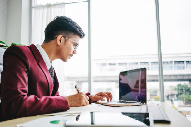 istock Young businessman typing on laptop keyboard 1478352271