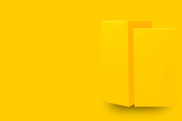 istock Two yellow carton box mockups 1478352787