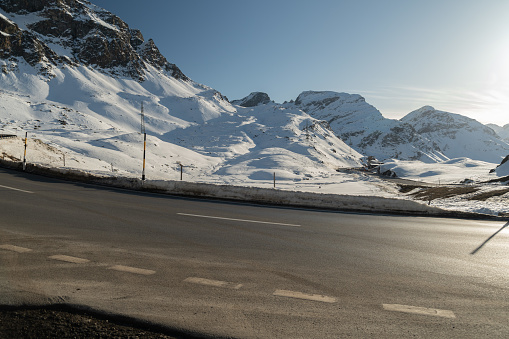 Julier pass, Switzerland, February 21, 2023 Alpine winter wonderland on the top of the Julier pass street on a sunny day