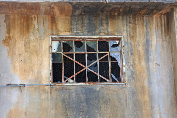 istock Window with broken windows in an abandoned house 1478356196