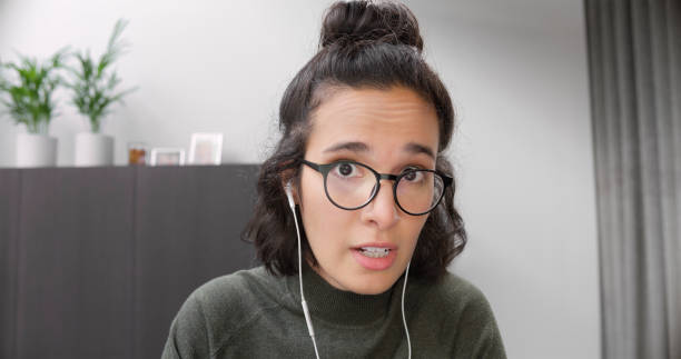 istock Woman wearing headphones 1478358797