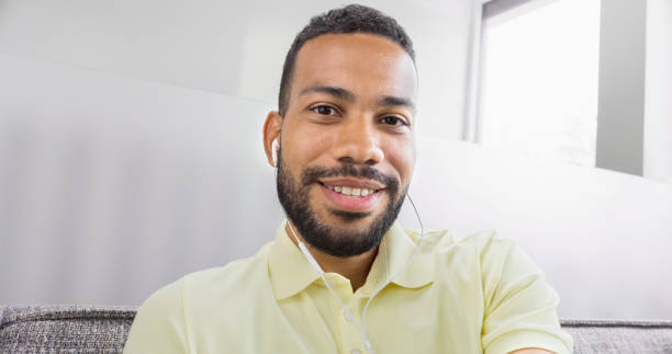 istock Man wearing headphones 1478358819