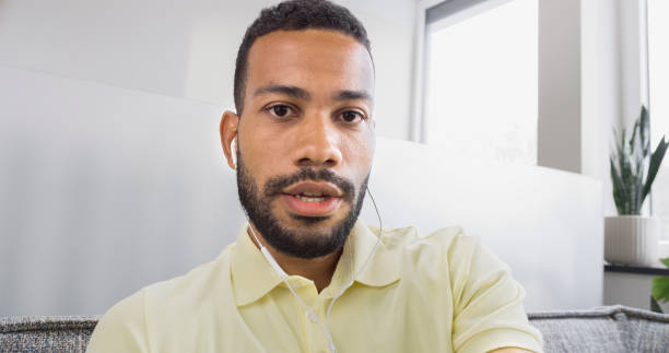 istock Man wearing headphones 1478358828