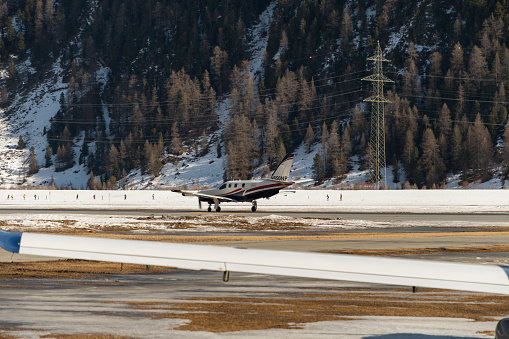 Samedan, Switzerland, February 21, 2023 Socata TBM-850 propeller aircraft is taxiing to its position