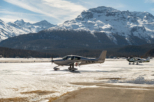 Samedan, Switzerland, February 21, 2023 Cirrus SR22T propeller aircraft is parking on the field