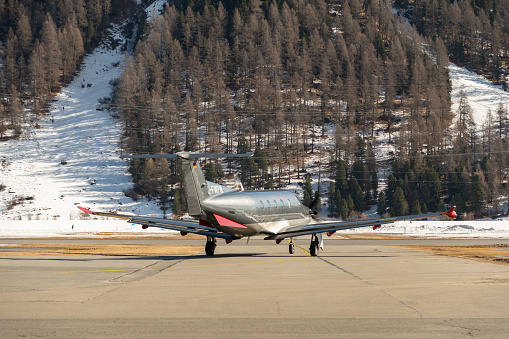 Samedan, Switzerland, February 21, 2023 Pilatus PC-12-47 propeller plane on the apron