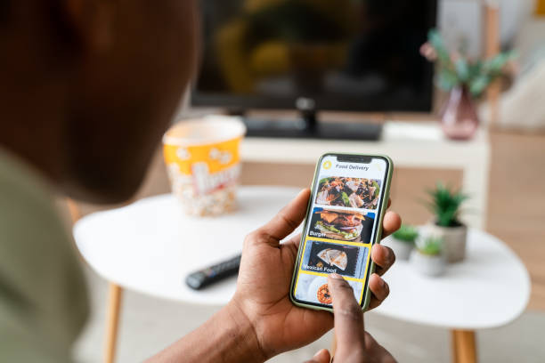 istock Crop black woman using smartphone 1478361732