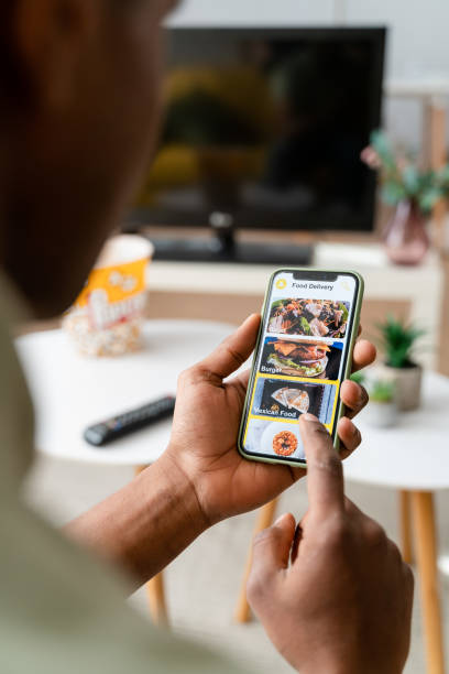 istock Crop black woman using smartphone 1478361790