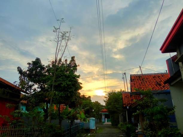 istock evening sun in the village 1478364392