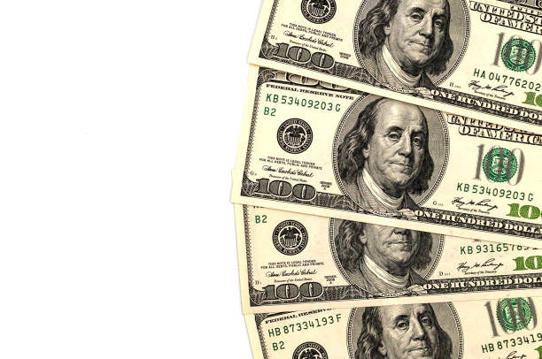 istock Hundred dollar bills isolated on white background 1478365975