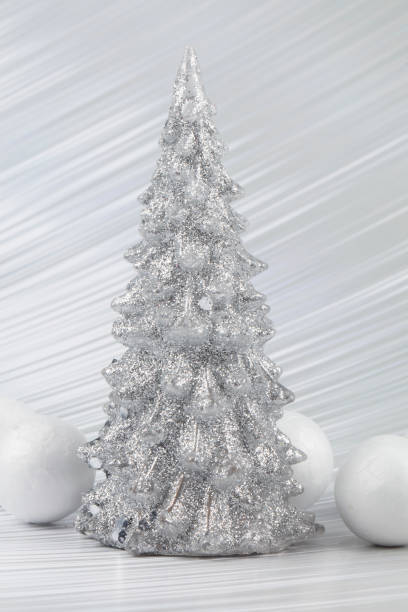istock Christmas or New Year background with silver snowy tree and white transitional decoration. Bright festive background. 1478368435