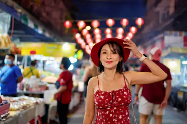 thai woman at nightmarket in yaowarat china town bangkok during chinese new year