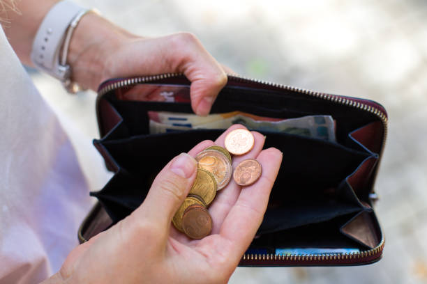 istock wallet with money and euro cents. 1478369144