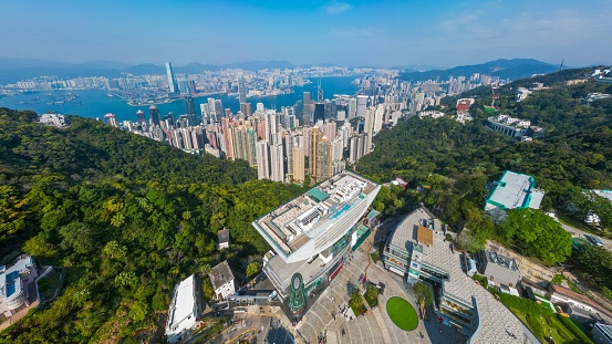 An aerial shot of Hong Kong cityscape with the Peak Tower.