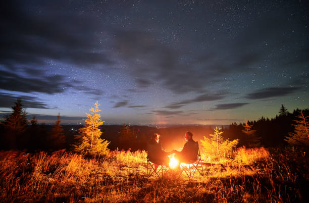 istock Happy couple staring at starry sky 1478372569