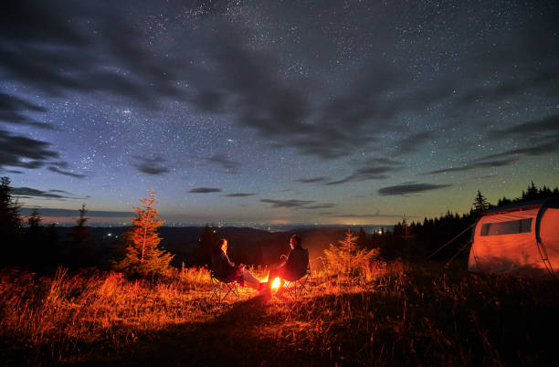 istock Happy couple staring at starry sky 1478372574