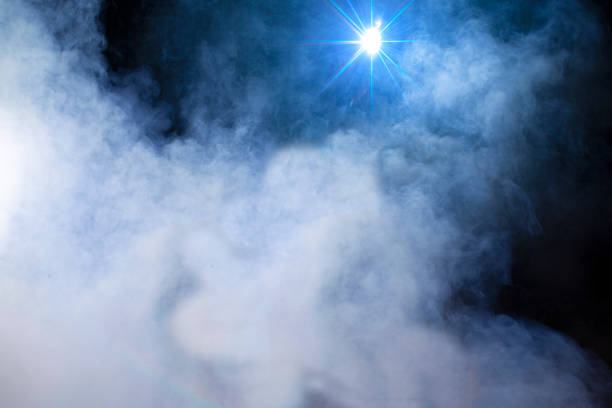 istock Stage smoke blue with light beam.Smoke star. 1478372695