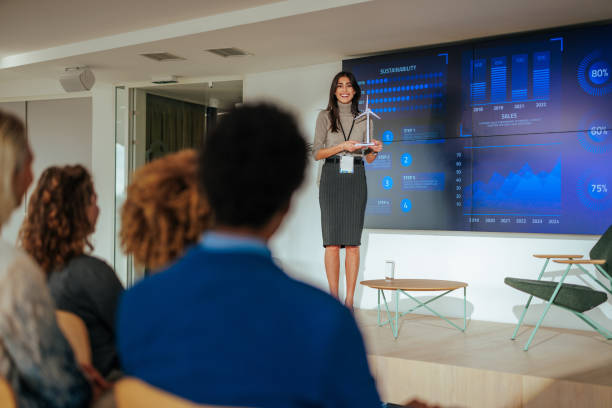 istock Female specialist educating business people on sustainable development. 1478372878