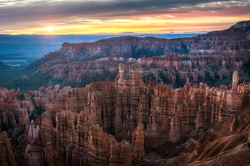 The sun rising above Thor's Hammer at Bryce Canyon National Park, Utah. United States of America.