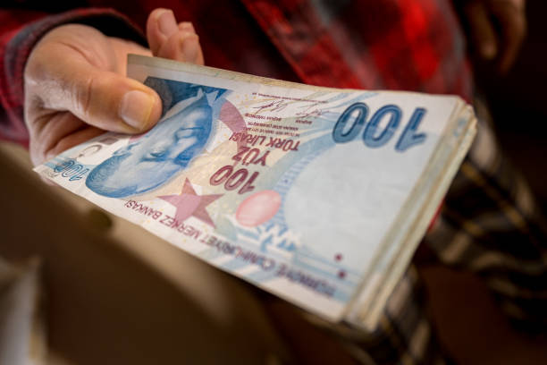 istock Hands holding lots of TL banknotes 1478375160