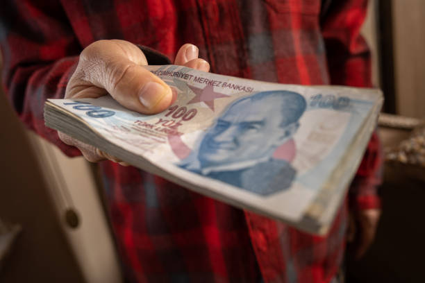 istock Hands holding lots of TL banknotes 1478375364