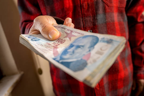 istock Hands holding lots of TL banknotes 1478375373