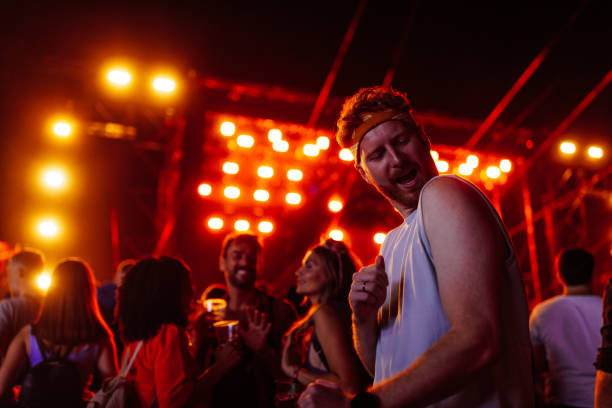 istock Ginger man dancing to music at concert 1478375401