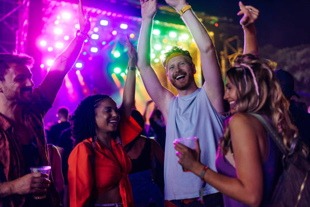 istock Friends dancing at concert 1478375528