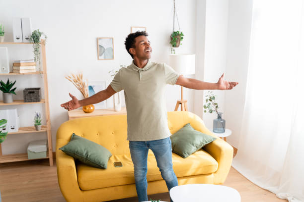istock Cheerful black man enjoying his new house 1478375694