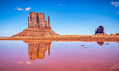 West and East Mitten Butte reflection at Monument Valley