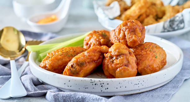 istock spicy buffalo chicken wings on plate 1478379861