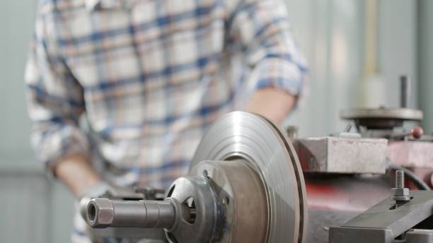 istock Asian industrial engineer or technician wearing safety uniform, operating milling machine in manufacturing workshop. Production line worker or metalworker working in metal factory. Concept of heavy industry, experienced and skill operator labor. 1478380429
